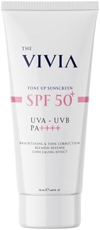 The Vivia Ton Eşitleyici ve Aydınlatıcı, Leke Karşıtı, Yüksek Koruyucu SPF50+ Pembe Renkli Güneş Kremi, 50 ml