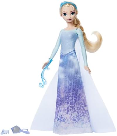 Alternative view of filminden ilham alan Mattel  Karlar Ülkesi Eğlenceli Sürprizler Elsa bebek seti, 5 aksesuar, 5 çıkartma ve 1 oyun alanı içeren 11 sürpriz, JBG59